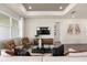 Relaxing living room featuring comfortable seating and large windows at 1967 Spring Shower Cir, Kissimmee, FL 34744