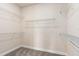 Bright walk-in closet featuring wire shelving for organized storage at 1967 Spring Shower Cir, Kissimmee, FL 34744