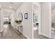 Light and bright hallway with wood-look flooring at 1967 Spring Shower Cir, Kissimmee, FL 34744