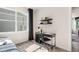Bedroom with window, desk and chair, and built-in shelves at 1967 Spring Shower Cir, Kissimmee, FL 34744