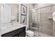 Bathroom with walk-in shower and modern vanity at 1967 Spring Shower Cir, Kissimmee, FL 34744