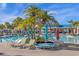 Relaxing pool deck with lounge chairs and umbrellas at 3954 Lana Ave, Davenport, FL 33897