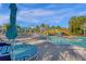 Pool area with lounge chairs and a bridge at 3954 Lana Ave, Davenport, FL 33897