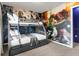 Bunk beds and a mural featuring Marvel characters decorate this bedroom at 3954 Lana Ave, Davenport, FL 33897