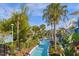 Relaxing lazy river winding through lush landscaping at 3954 Lana Ave, Davenport, FL 33897