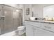 Bathroom with shower, toilet, and granite countertop at 3954 Lana Ave, Davenport, FL 33897