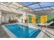 Enjoy this refreshing, private pool with outdoor patio and grill at 3954 Lana Ave, Davenport, FL 33897