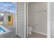 Small bathroom with toilet located next to the pool at 3954 Lana Ave, Davenport, FL 33897