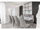 Bright dining room features a modern table and gray chairs at 3954 Lana Ave, Davenport, FL 33897