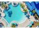 Resort-style pool with surrounding lounge chairs and umbrellas at 3954 Lana Ave, Davenport, FL 33897