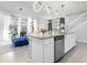 Open kitchen features a large island and stainless steel appliances at 3954 Lana Ave, Davenport, FL 33897