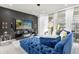 Gathering room features a large TV and comfortable seating at 3954 Lana Ave, Davenport, FL 33897
