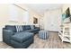 Living room with sectional sofa and built-in media console at 2984 Salted Rim Rd, Kissimmee, FL 34747