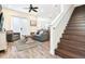 Spacious living room with a comfortable sofa and access to a patio at 2984 Salted Rim Rd, Kissimmee, FL 34747