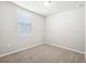 Spacious bedroom with neutral walls and carpeted flooring at 1705 Forest Run Ln, Auburndale, FL 33823