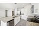 Modern kitchen with stainless steel appliances and granite countertops at 1705 Forest Run Ln, Auburndale, FL 33823