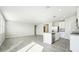 Open kitchen with island, stainless steel appliances and tile flooring at 1705 Forest Run Ln, Auburndale, FL 33823