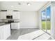 Eat-in kitchen with sliding glass doors leading to the backyard at 1705 Forest Run Ln, Auburndale, FL 33823