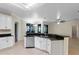 Kitchen with stainless steel appliances and an island at 2855 Gopherwood Way, Clermont, FL 34711
