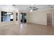 Bright dining area with tile flooring and access to patio at 2855 Gopherwood Way, Clermont, FL 34711
