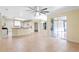 Spacious kitchen with island and granite countertops at 2855 Gopherwood Way, Clermont, FL 34711