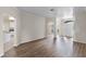 Bright and spacious living room with hardwood floors and views to backyard at 2855 Gopherwood Way, Clermont, FL 34711