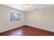 Bright bedroom with hardwood floors and window at 2855 Gopherwood Way, Clermont, FL 34711