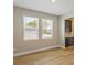 Light-filled dining room featuring wood-look floors and neutral walls at 2137 Divot Dr, Daytona Beach, FL 32124