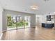 Bright living room with sliding glass doors leading to backyard at 2149 Divot Dr, Daytona Beach, FL 32124