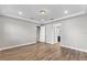 Main bedroom with wood-look floors and ensuite bathroom access at 2149 Divot Dr, Daytona Beach, FL 32124