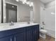 Double vanity bathroom with a tub and shower at 2149 Divot Dr, Daytona Beach, FL 32124
