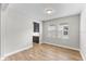 Spacious dining room with wood-look tile floors and built-in cabinetry at 2149 Divot Dr, Daytona Beach, FL 32124