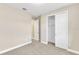 Bright bedroom with neutral walls, carpet, and a large closet at 3116 Legends Preserve Dr, Daytona Beach, FL 32124