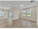 Bright dining room with hardwood floors and access to a patio at 3116 Legends Preserve Dr, Daytona Beach, FL 32124