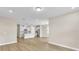Open kitchen with white cabinets and a large island at 3116 Legends Preserve Dr, Daytona Beach, FL 32124
