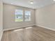 Bright and airy bedroom with hardwood floors and neutral walls at 3116 Legends Preserve Dr, Daytona Beach, FL 32124