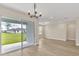 Spacious dining room with hardwood floors and a chandelier at 3116 Legends Preserve Dr, Daytona Beach, FL 32124