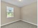 Empty bedroom with carpeted floor and window at 3116 Legends Preserve Dr, Daytona Beach, FL 32124