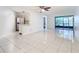Bright living room with tile floors and sliding glass doors at 3937 Atrium Dr # 5, Orlando, FL 32822