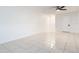 Bright living room featuring tile floors and ceiling fan at 3937 Atrium Dr # 5, Orlando, FL 32822