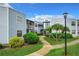 Exterior view of building with landscaping at 3937 Atrium Dr # 5, Orlando, FL 32822