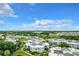 An aerial view of a residential community, showing buildings, landscaping, and parking areas at 3937 Atrium Dr # 5, Orlando, FL 32822