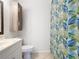 Clean bathroom with updated vanity and shower at 3937 Atrium Dr # 5, Orlando, FL 32822