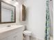 Clean bathroom with white vanity, large mirror, and shower/tub combo at 3937 Atrium Dr # 5, Orlando, FL 32822