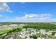 Wide aerial view of condo community and distant landscape at 3937 Atrium Dr # 5, Orlando, FL 32822