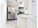 Kitchen with stainless steel appliances and white cabinets at 3937 Atrium Dr # 5, Orlando, FL 32822