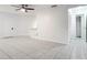 Living area with tile floors and access to other rooms at 3937 Atrium Dr # 5, Orlando, FL 32822