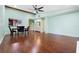 Bright dining area with wood floors and pass-through kitchen at 8 Escondido Cir # 78, Altamonte Springs, FL 32701