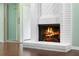 Cozy living room with a brick fireplace, perfect for relaxing evenings at 8 Escondido Cir # 78, Altamonte Springs, FL 32701