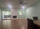 Spacious living room with a fireplace and laminate flooring at 8 Escondido Cir # 78, Altamonte Springs, FL 32701